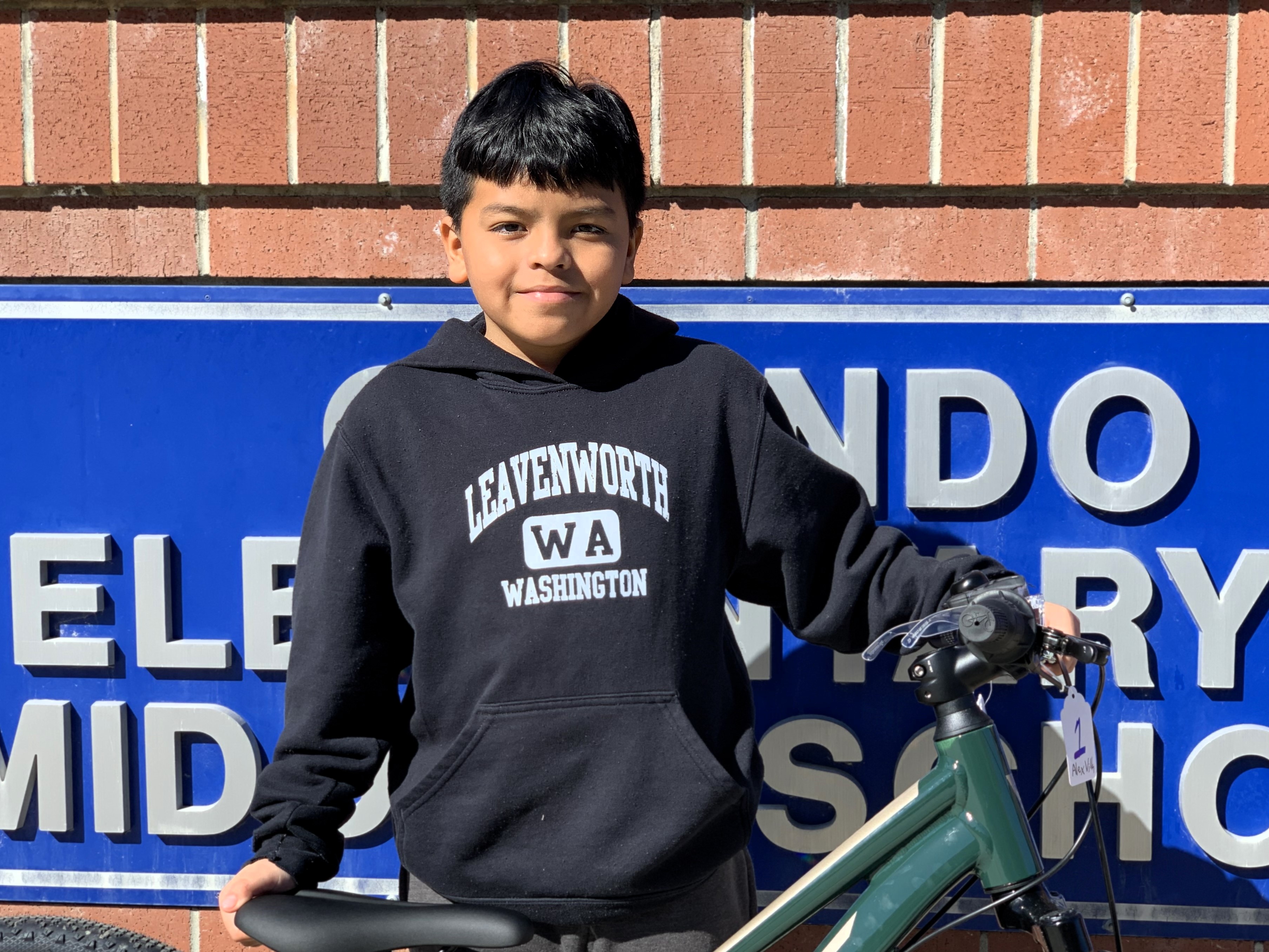 Alex and his new bike.